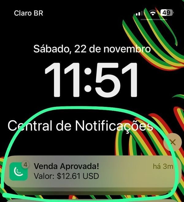 Tela de bloqueio com a notificação: Venda aprovada, valor 12,61 dólares.
